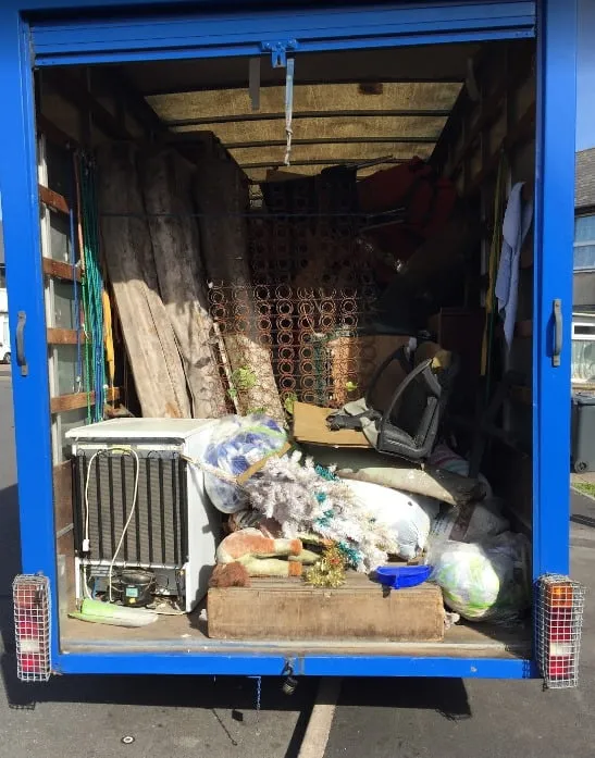 The Cleansweep House Clearance Specialists' van being loaded up at a Birmingham property